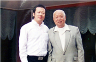 Karl with Chen Liang (Conductor)